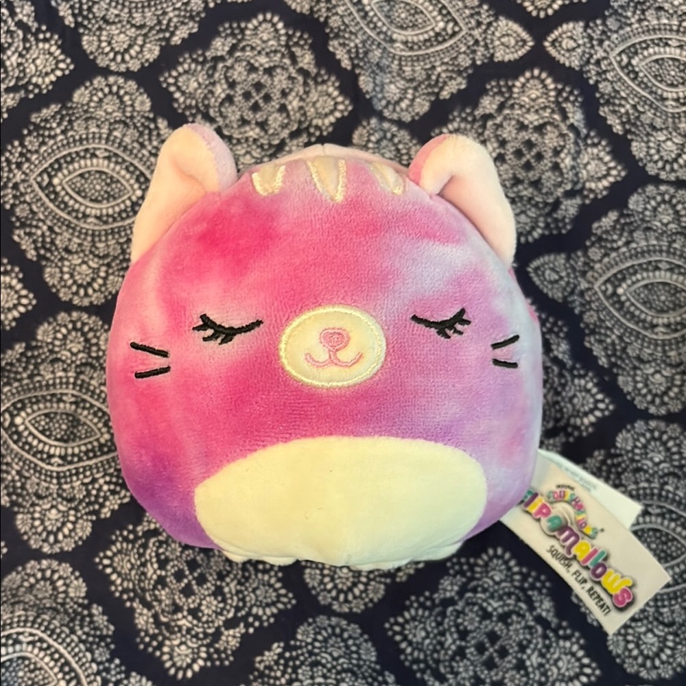 Squishmallows flip Pink and Lavender Kitty Plush and black and white dog